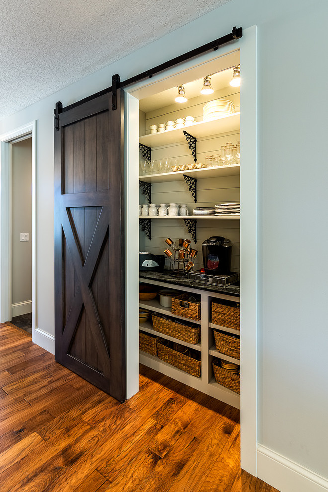 Inspiration for a small transitional single-wall kitchen pantry in Chicago.