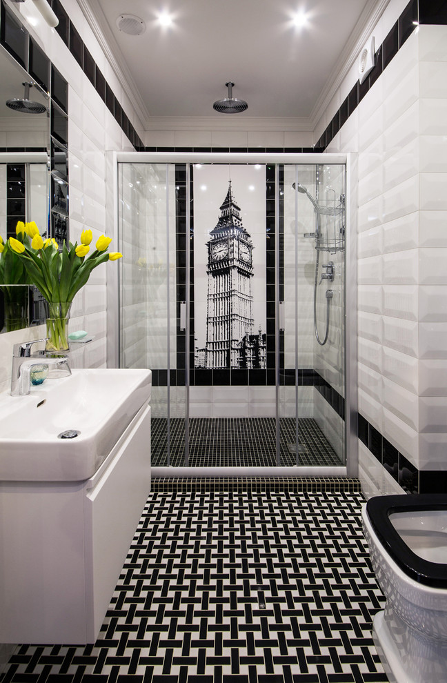 Inspiration for a contemporary 3/4 bathroom in Moscow with flat-panel cabinets, white cabinets, an alcove shower, white tile, black and white tile, black tile, an integrated sink, multi-coloured floor and a sliding shower screen.
