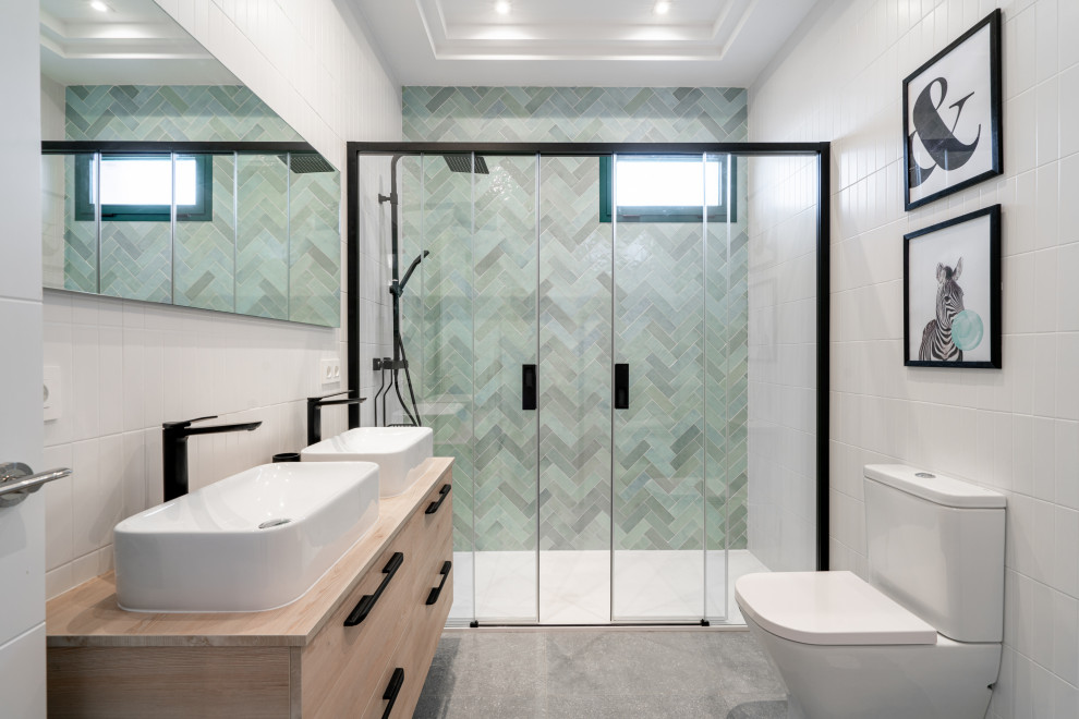 Inspiration for a large contemporary 3/4 wet room bathroom in Other with flat-panel cabinets, white cabinets, a two-piece toilet, white tile, ceramic tile, blue walls, porcelain floors, an undermount sink, solid surface benchtops, grey floor, a sliding shower screen, white benchtops, an enclosed toilet, a single vanity and a built-in vanity.