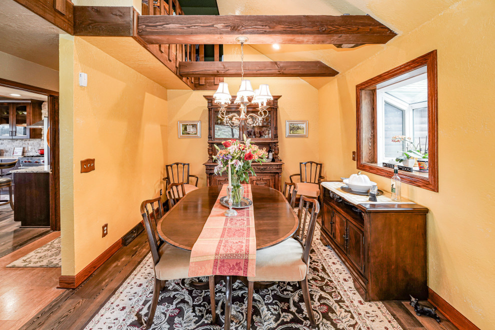 Example of a mountain style dining room design in Milwaukee