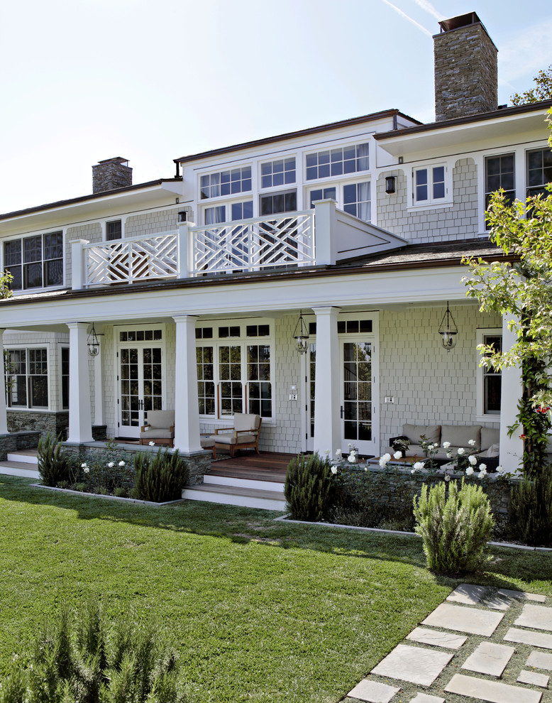 This is an example of a traditional verandah in Los Angeles with decking and a roof extension.