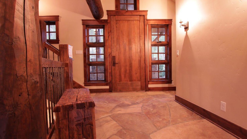 Mountain style entryway photo in Denver