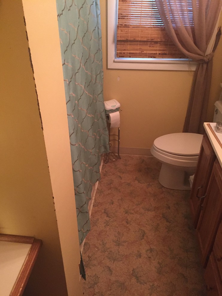 Example of a transitional home design design in Philadelphia