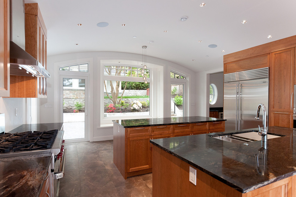 Photo of a contemporary kitchen in Vancouver with stainless steel appliances.