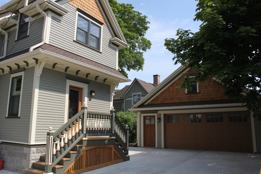 Mid-sized minimalist gray two-story wood exterior home photo