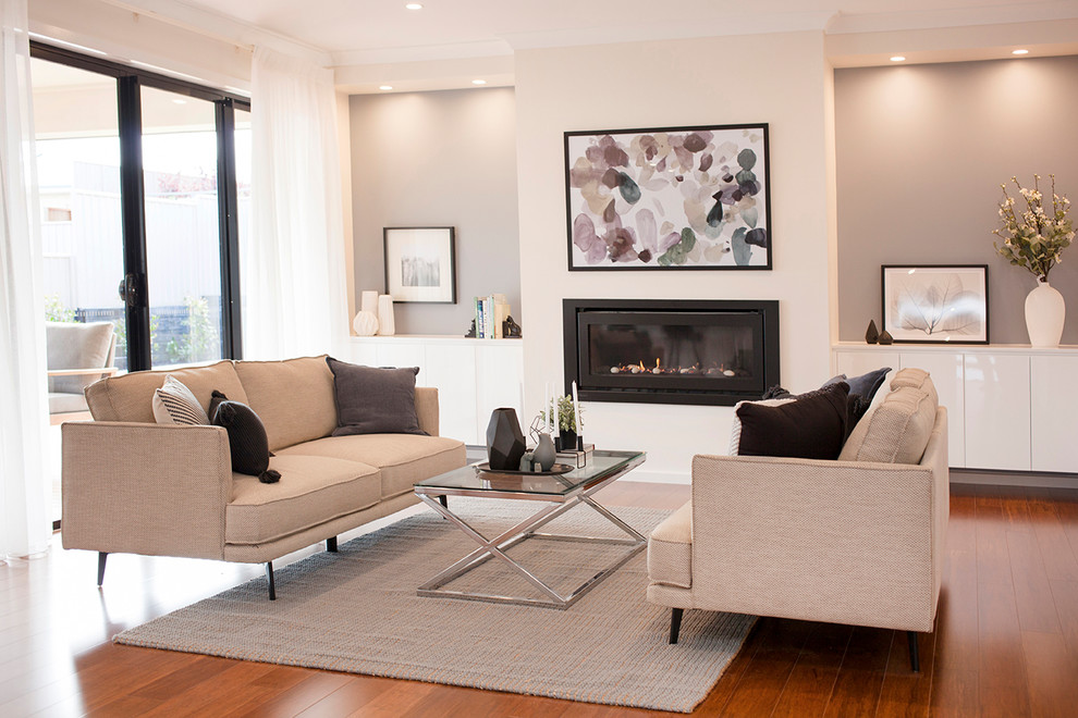 Photo of a large contemporary open concept living room in Adelaide with a standard fireplace.