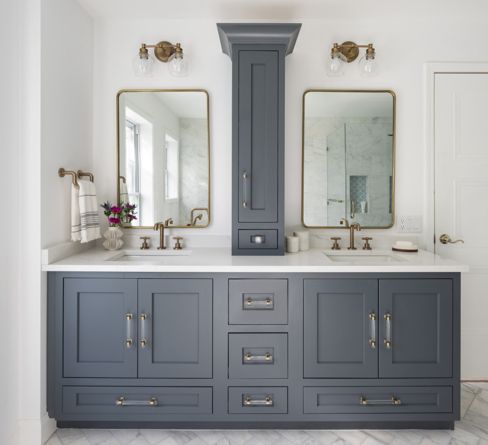 Design ideas for a large master bathroom in Boston with blue cabinets, a freestanding tub, a curbless shower, a bidet, marble, grey walls, marble floors, an undermount sink, engineered quartz benchtops, white floor, a hinged shower door, white benchtops, a niche, a double vanity and a freestanding vanity.