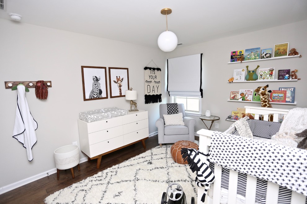 Inspiration for a modern gender-neutral nursery in Other with grey walls, dark hardwood floors and brown floor.