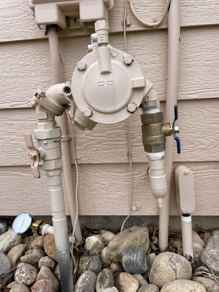 Inground irrigation system backflow preventer reduces pressure?