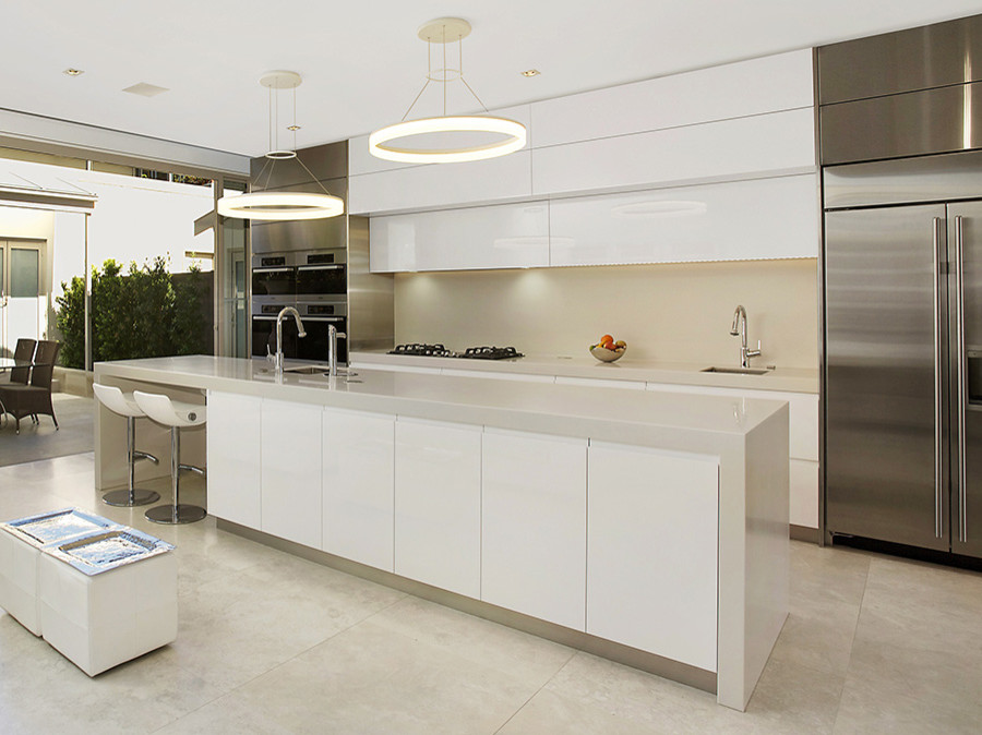 Large modern galley kitchen in Sydney with with island.
