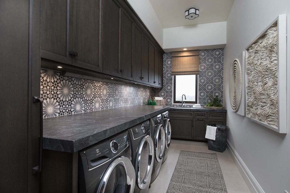 This is an example of a mediterranean laundry room in Orange County.
