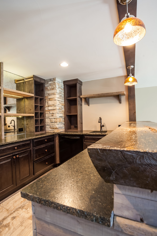 Example of a mountain style home design design in Denver