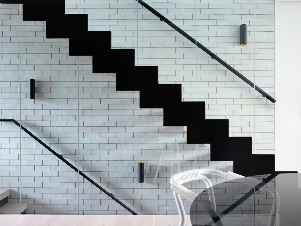 Photo of a contemporary straight staircase in Melbourne.