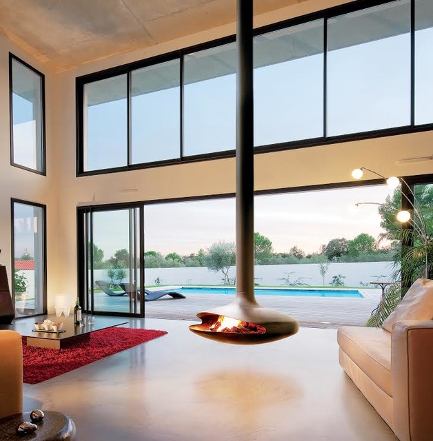 CHEMIN&Eacute;E CENTRALE / CENTRAL FIREPLACE contemporary-vardagsrum