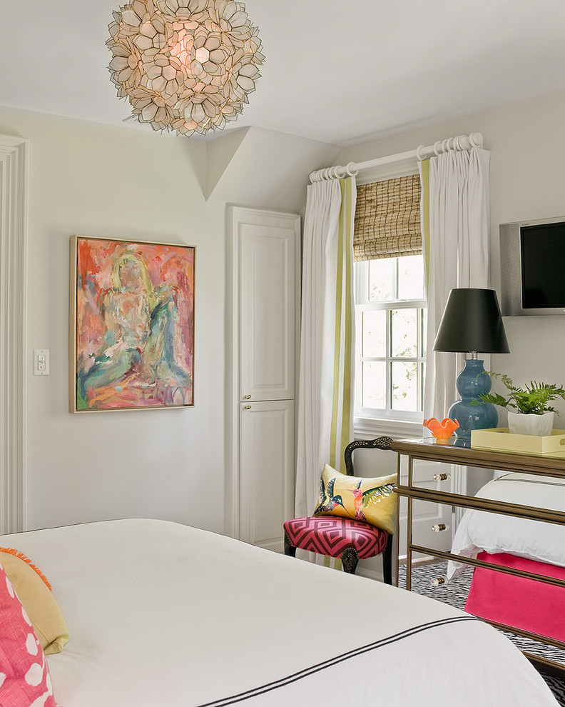 This is an example of a transitional bedroom in Boston with beige walls.