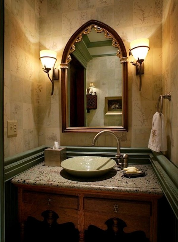 Example of a ceramic tile bathroom design with a vessel sink, dark wood cabinets, limestone countertops and an undermount tub