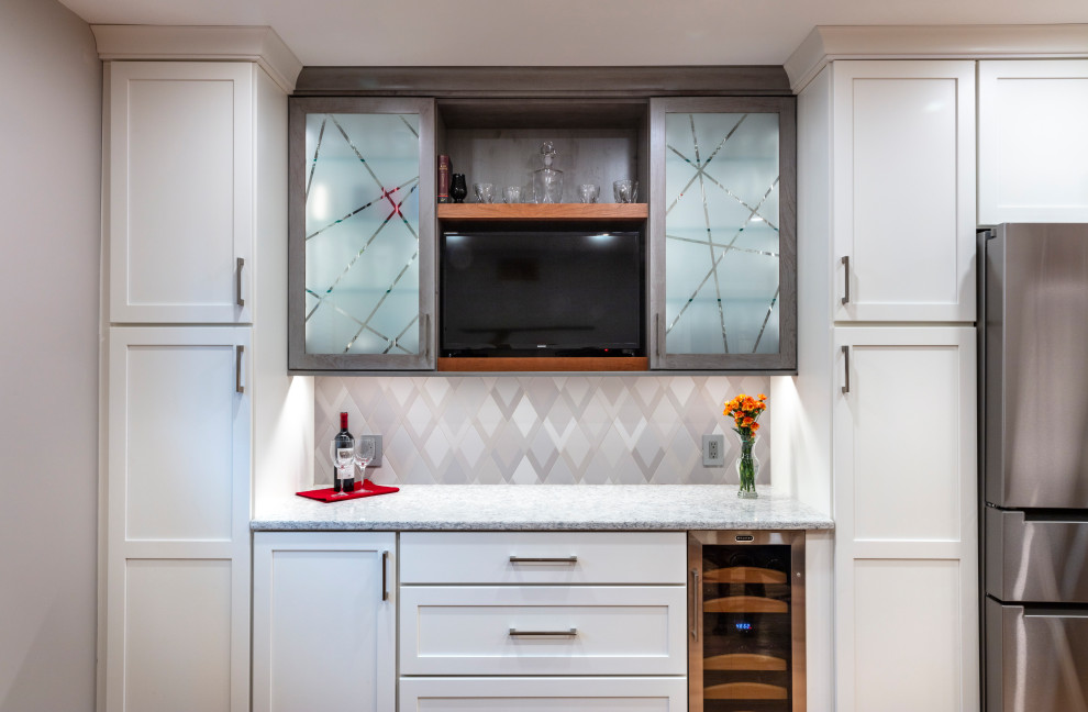 Inspiration for a transitional kitchen remodel with shaker cabinets, quartz countertops and stainless steel appliances