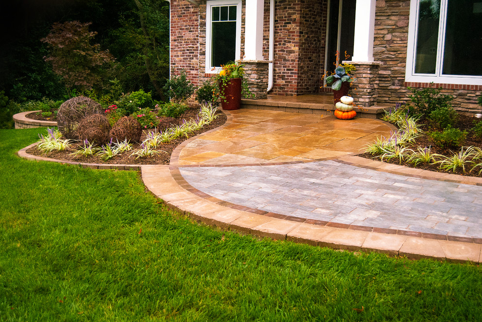 Photo of a transitional front yard garden path in St Louis for fall.