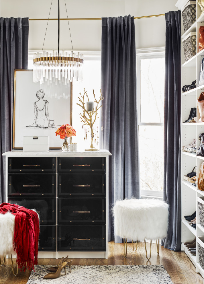 Closet - transitional women's medium tone wood floor and brown floor closet idea in Atlanta with open cabinets and white cabinets