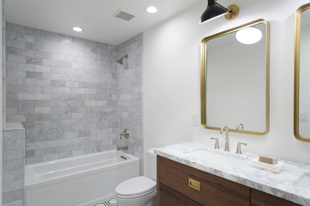 Design ideas for a mid-sized contemporary bathroom in Salt Lake City with flat-panel cabinets, blue cabinets and light hardwood floors.