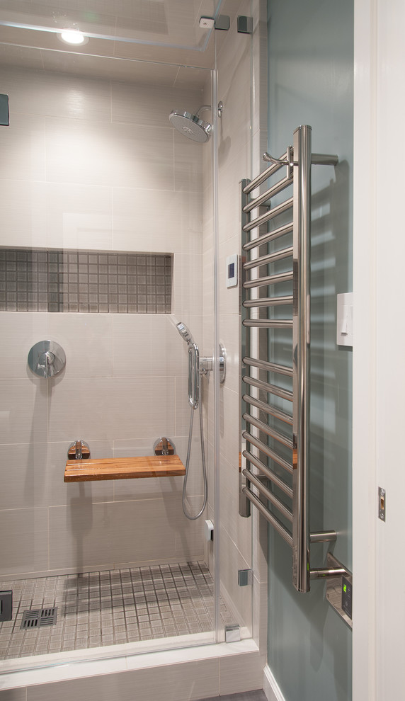 This is an example of a small modern bathroom in San Francisco with an undermount sink, flat-panel cabinets, medium wood cabinets, engineered quartz benchtops, a one-piece toilet, gray tile, porcelain tile, green walls, porcelain floors and with a sauna.
