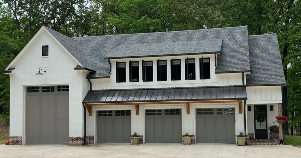 Photo of a large country detached garage with four or more cars.
