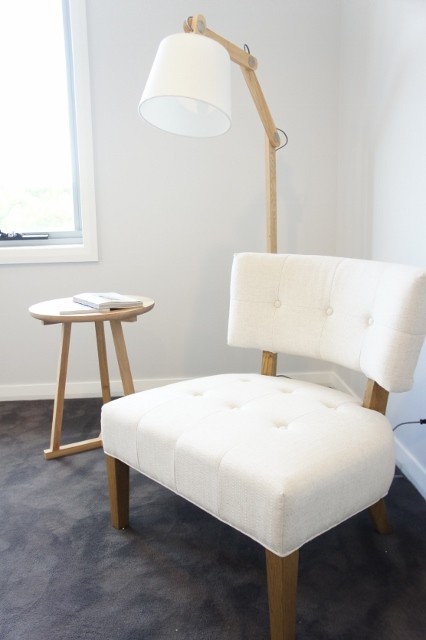 This is an example of a contemporary bedroom in Sydney.