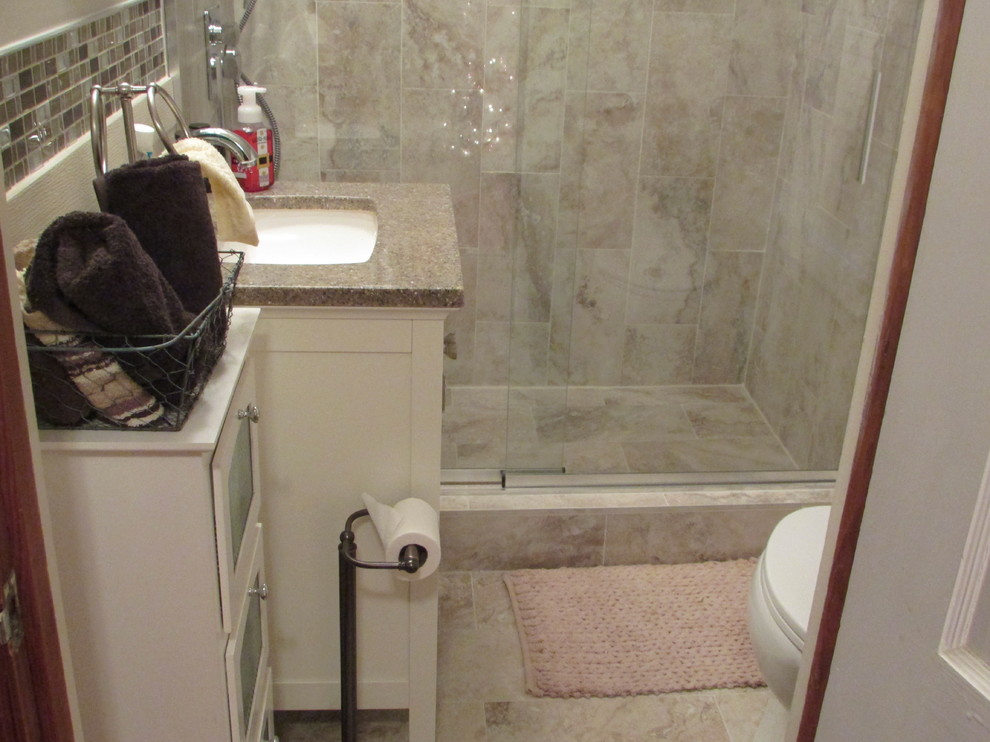 Example of a small transitional master beige tile and ceramic tile ceramic tile home design design with furniture-like cabinets, white cabinets, a two-piece toilet, beige walls, an integrated sink and quartz countertops