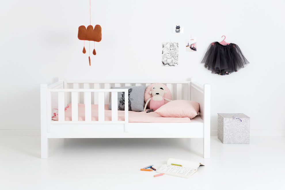 This is an example of a scandinavian gender-neutral kids' bedroom for kids 4-10 years old in Other.