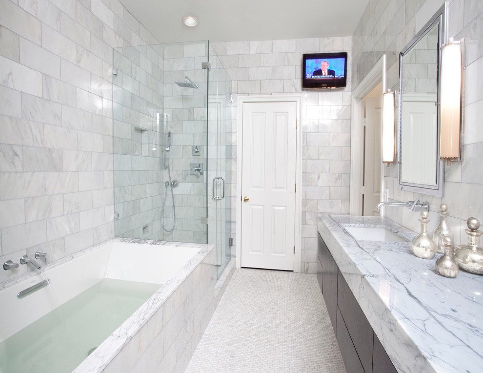 Photo of a contemporary bathroom in New Orleans with an undermount sink, flat-panel cabinets, an undermount tub, a corner shower and white tile.