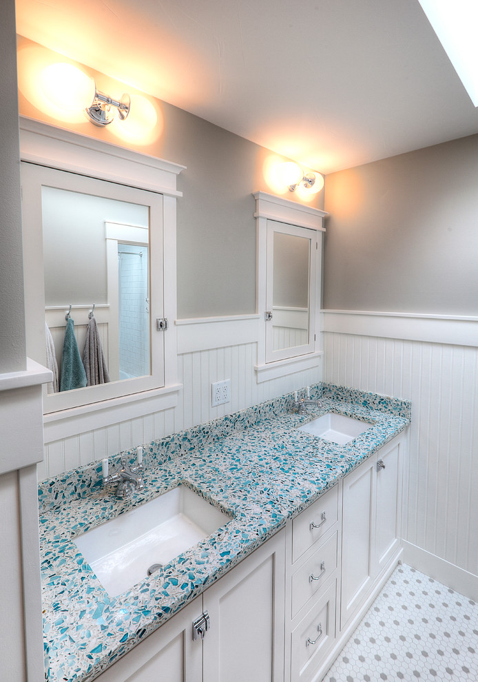 Photo of a beach style bathroom in Other with terrazzo benchtops and white tile.