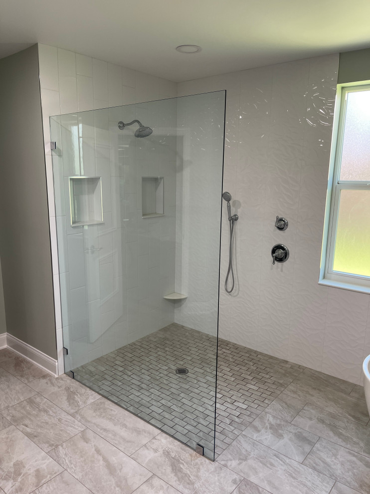 Design ideas for a mid-sized contemporary master bathroom in Tampa with shaker cabinets, grey cabinets, an undermount sink, engineered quartz benchtops, a double vanity and a built-in vanity.
