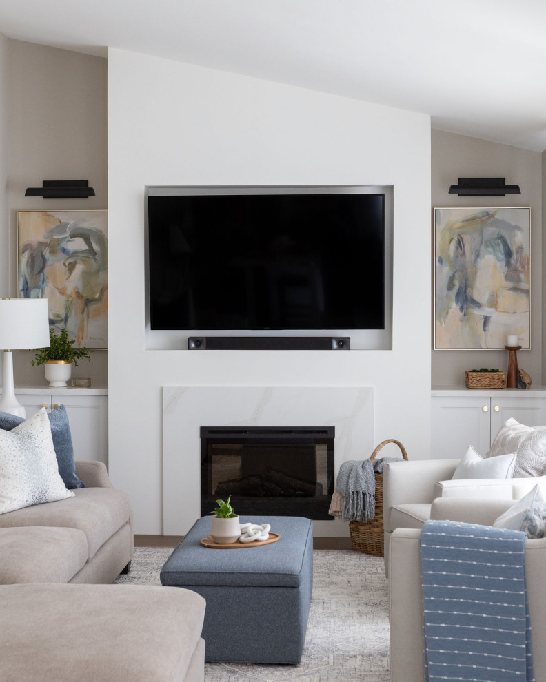 Inspiration for a small transitional open concept medium tone wood floor, brown floor and vaulted ceiling living room remodel in Toronto with beige walls, a standard fireplace, a stone fireplace and a wall-mounted tv