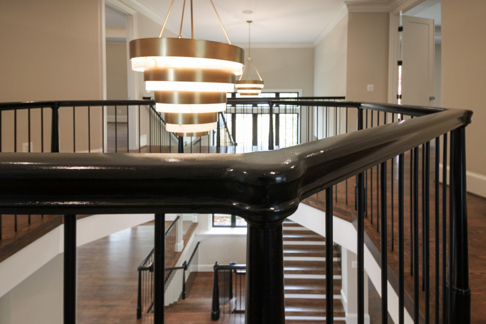 Geräumige Stilmix Holztreppe in U-Form mit Holz-Setzstufen und Mix-Geländer in Washington, D.C.