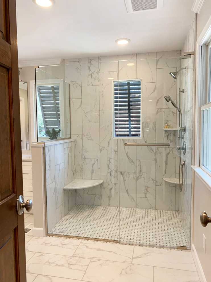 Large transitional bathroom in Raleigh with shaker cabinets, white cabinets, a curbless shower, grey walls, porcelain floors, an undermount sink, engineered quartz benchtops, white floor, a hinged shower door, white benchtops, a laundry, a single vanity and a built-in vanity.