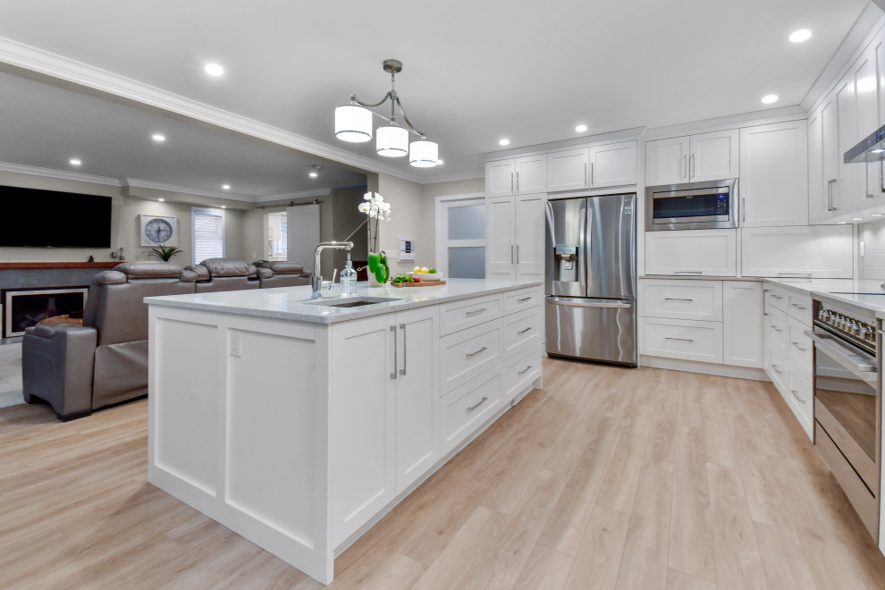 Example of a transitional kitchen design in Vancouver
