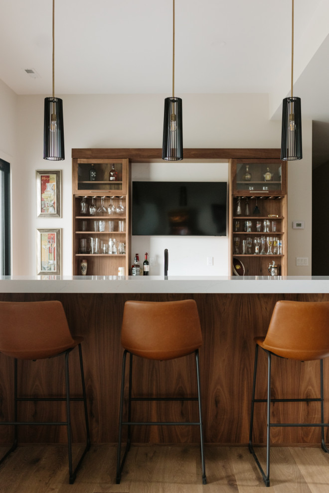 Inspiration for a contemporary home bar in Omaha.
