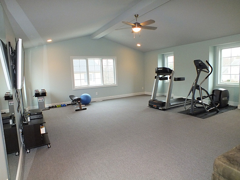 Design ideas for a contemporary home gym in Cleveland.