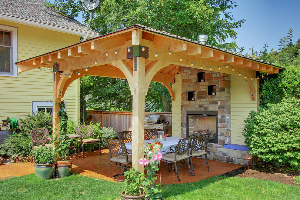 Design ideas for a contemporary patio in Seattle with a gazebo/cabana and a fire feature.