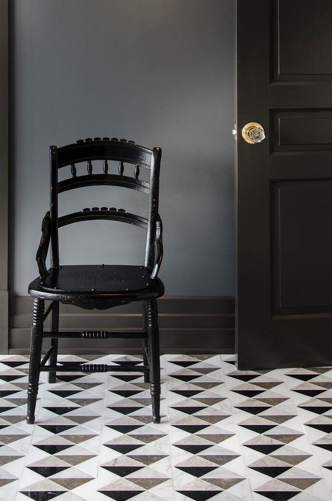 Inspiration for a large transitional marble floor entryway remodel with gray walls