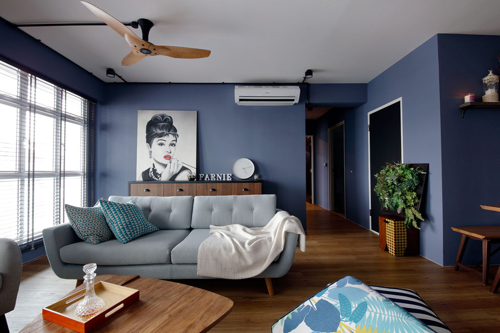 This is an example of a transitional living room in Singapore.