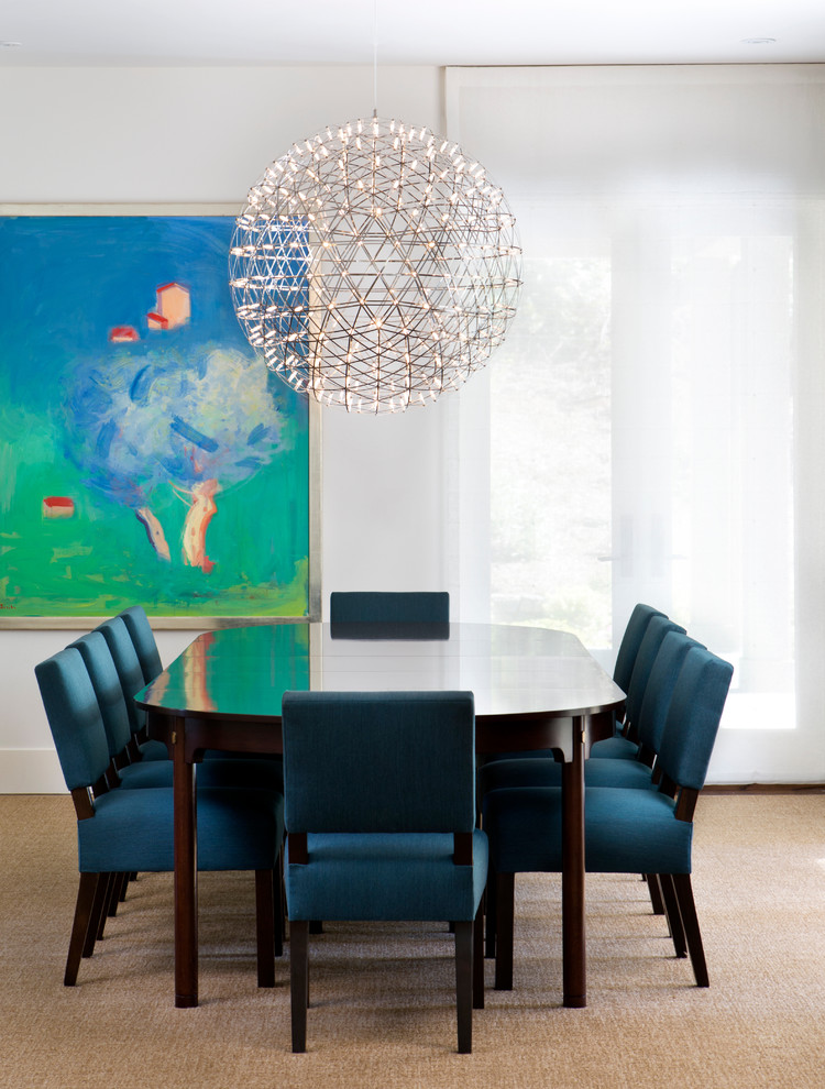 Photo of a transitional dining room in San Francisco with white walls and carpet.