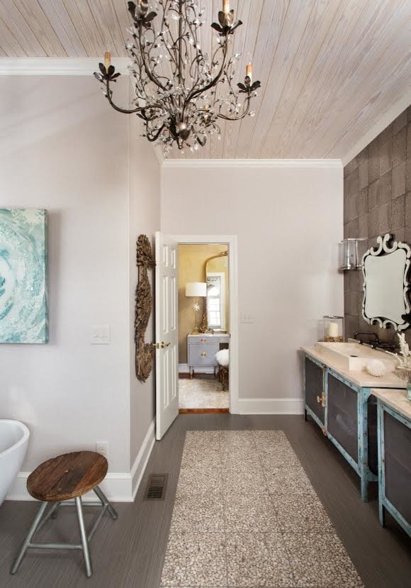 Inspiration for a large beach style master bathroom in Orange County with furniture-like cabinets, blue cabinets, a freestanding tub, an alcove shower, gray tile, porcelain tile, grey walls, porcelain floors, a vessel sink, limestone benchtops and grey floor.