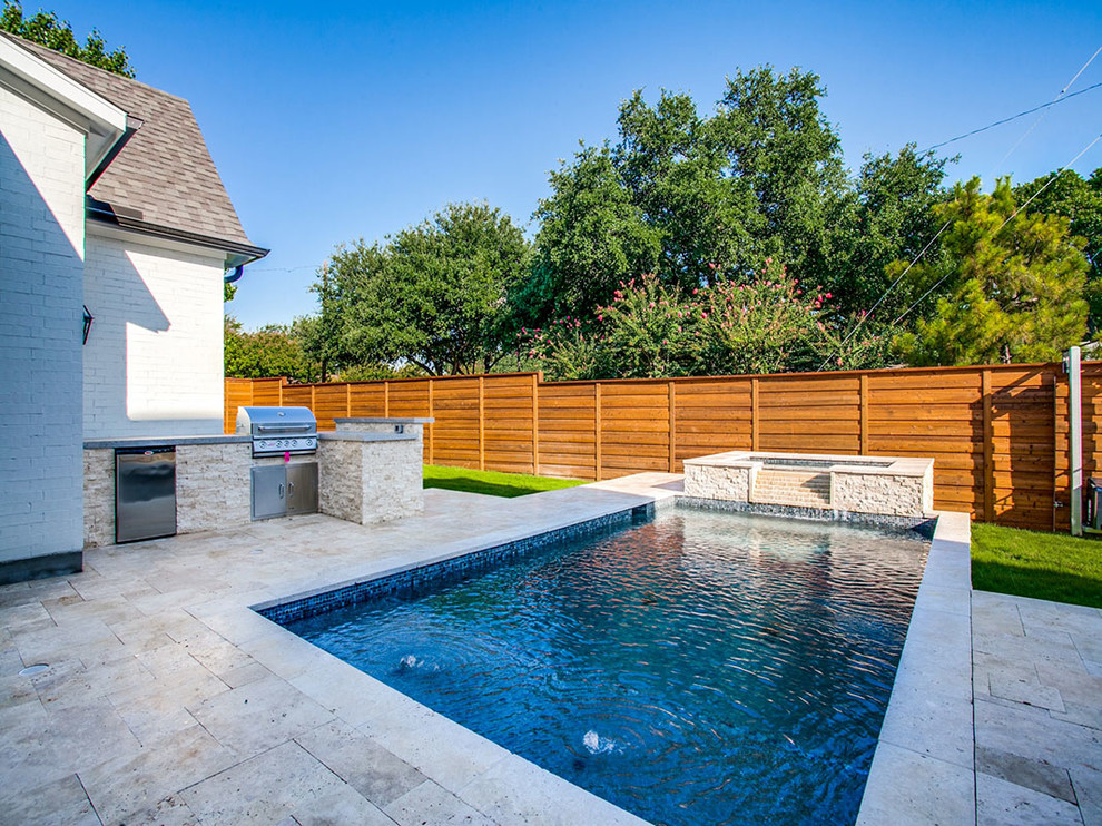 Example of a transitional two-story pool design in Dallas