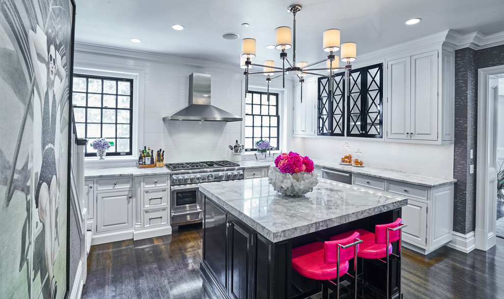 Inspiration for a transitional l-shaped kitchen in Philadelphia with raised-panel cabinets, white cabinets, marble benchtops, white splashback, stainless steel appliances, dark hardwood floors and with island.