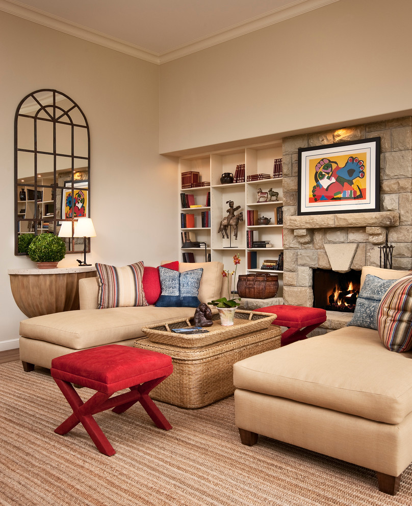 Photo of a transitional living room in Santa Barbara with beige walls and a stone fireplace surround.