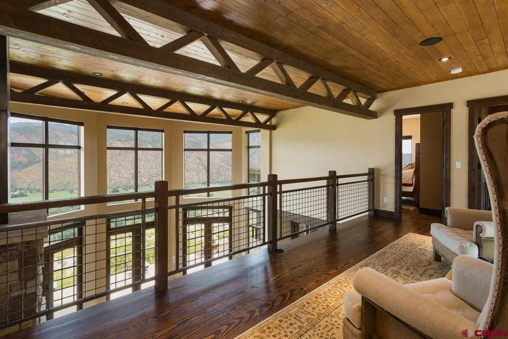 Example of a mountain style home design design in Phoenix