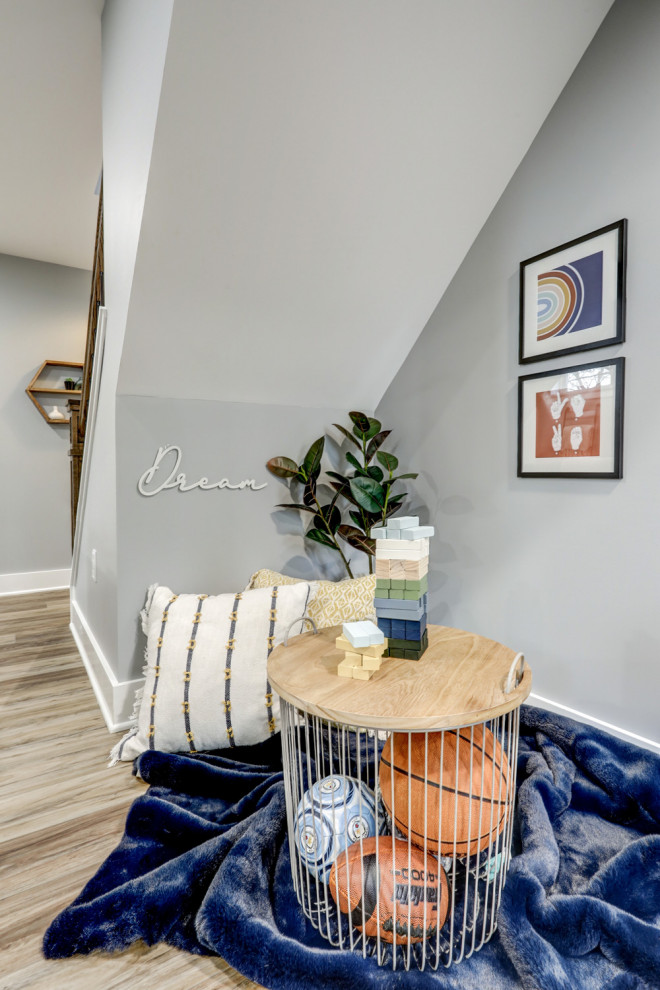 Basement - large transitional walk-out vinyl floor and brown floor basement idea with gray walls
