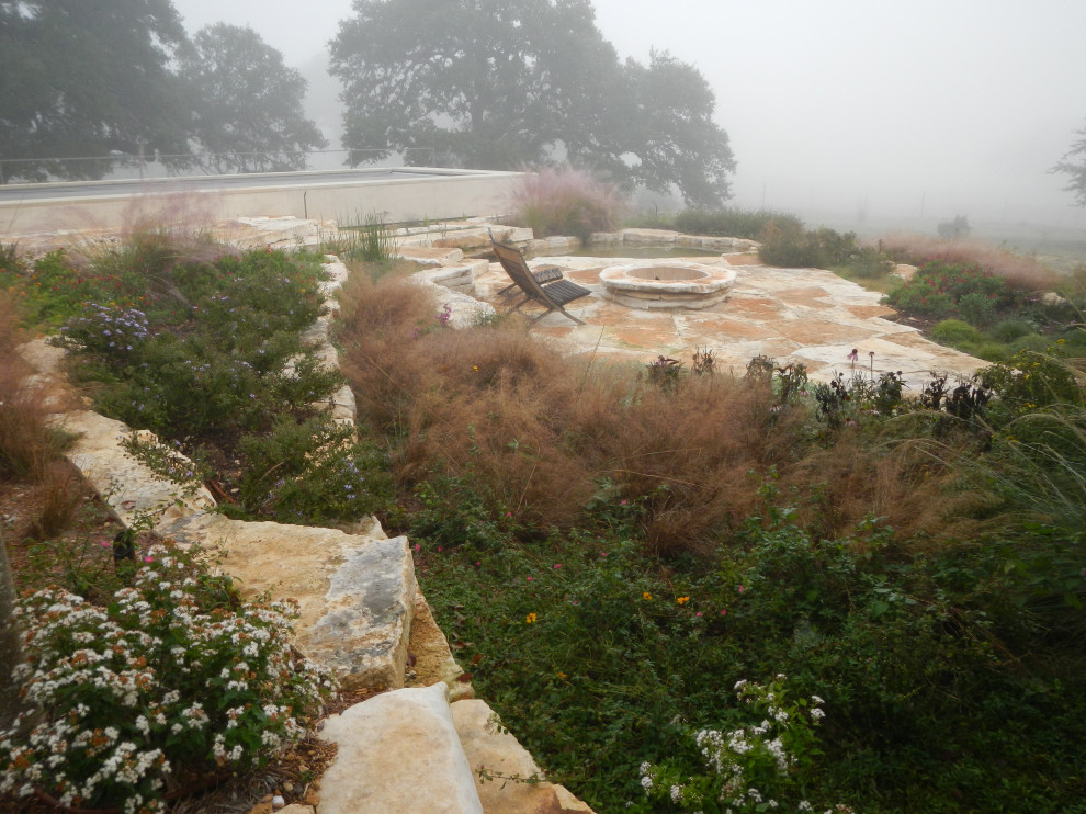 Example of a mountain style home design design in Austin