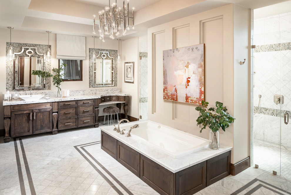 Master bathroom in Phoenix with dark wood cabinets, a drop-in tub, a curbless shower, multi-coloured tile, mosaic tile, beige walls, a vessel sink, multi-coloured floor, a hinged shower door, multi-coloured benchtops and recessed-panel cabinets.
